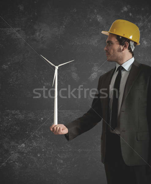 Imprenditore turbina eolica mano uomo tecnologia verde Foto d'archivio © alphaspirit