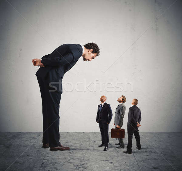 Severe boss humiliates his employees Stock photo © alphaspirit