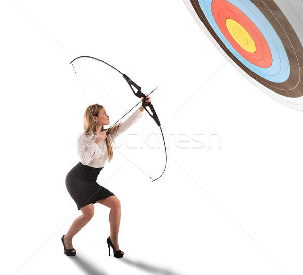 Businesswoman point to success in business with arrow Stock photo © alphaspirit