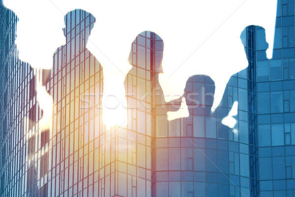 Businessmen that work together in office. Concept of teamwork and partnership Stock photo © alphaspirit