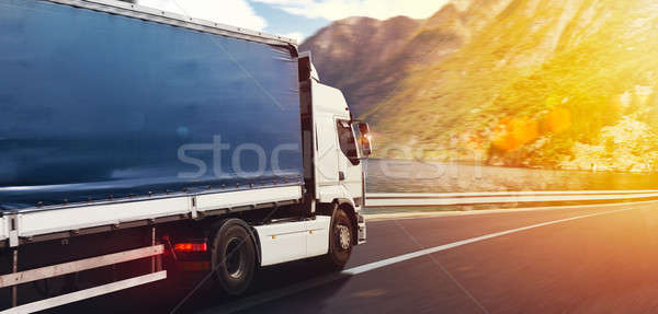 Truck run fast on the highway to deliver Stock photo © alphaspirit