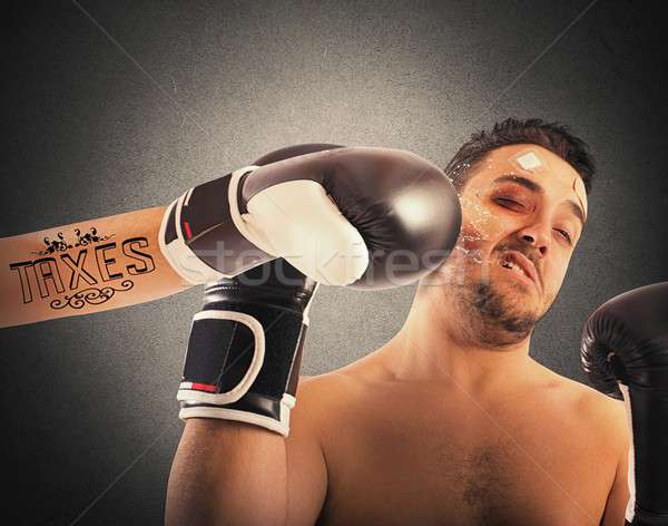 Boxer with taxes tattoo Stock photo © alphaspirit