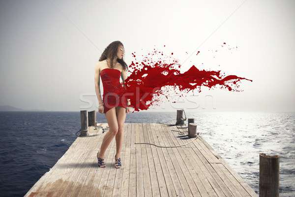 Kreatív divat robbanás vörös ruha tengerpart test Stock fotó © alphaspirit