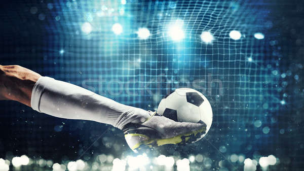 Close up of a soccer striker ready to kicks the ball in the football goal Stock photo © alphaspirit