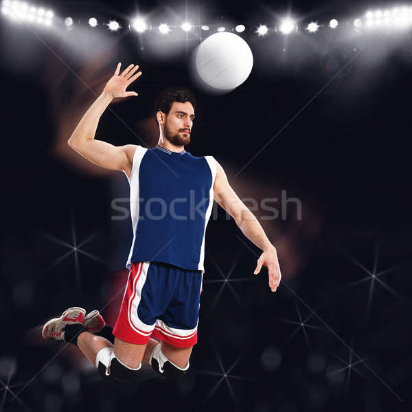 Volleyball player beats ball Stock photo © alphaspirit