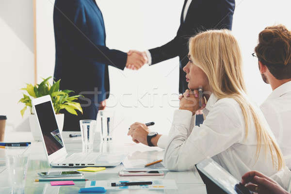 Business people at the office work together. concept of teamwork and partnership Stock photo © alphaspirit
