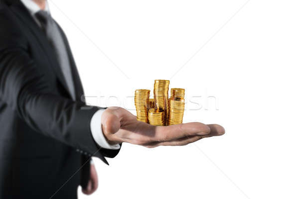 Businessman hold piles of money. Concept of success and company growth Stock photo © alphaspirit