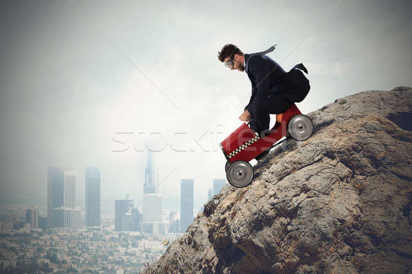 Difficult carrer with driving businessman Stock photo © alphaspirit