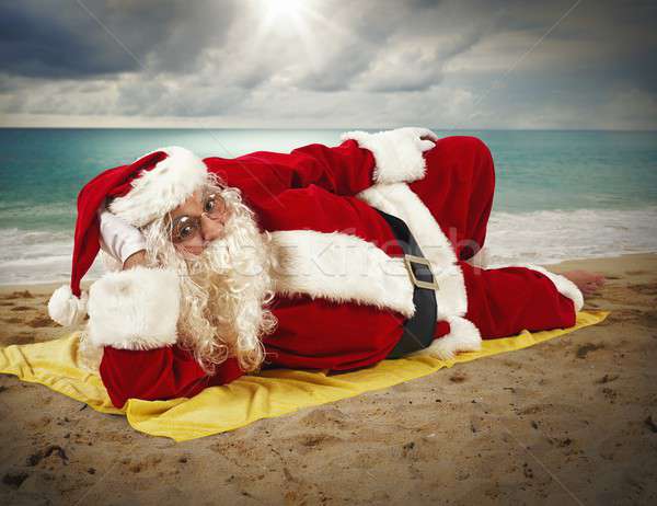 Beach holiday of Santa Claus Stock photo © alphaspirit