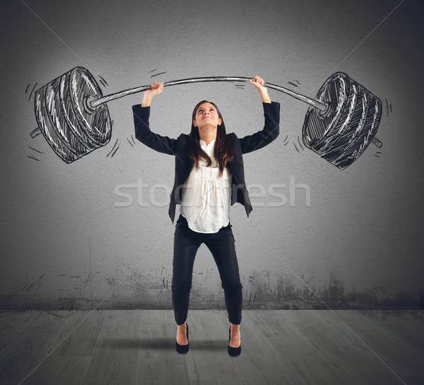 Strong businesswoman Stock photo © alphaspirit