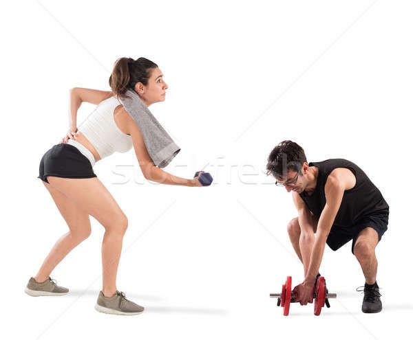 Stock photo: Boy and girl having difficulty at the gym