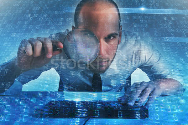 Businessman found a backdoor access on a computer. Concept of internet security Stock photo © alphaspirit
