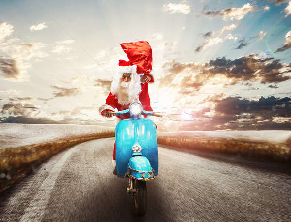 Fast Santa Claus on motorbike Stock photo © alphaspirit