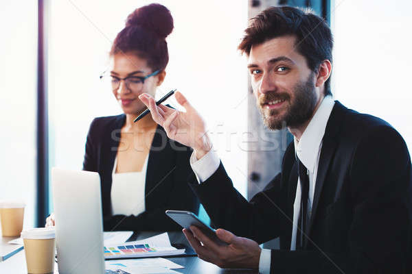 Business people work together. Teamwork and partnership concept Stock photo © alphaspirit