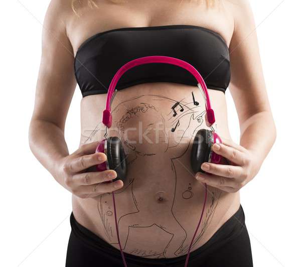 Unborn baby listen to music Stock photo © alphaspirit