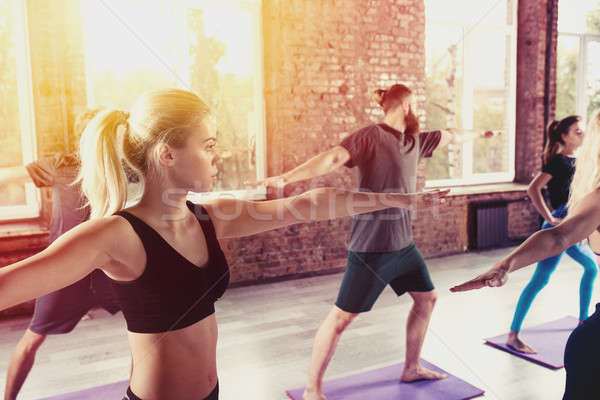 People do stretching at the gym Stock photo © alphaspirit