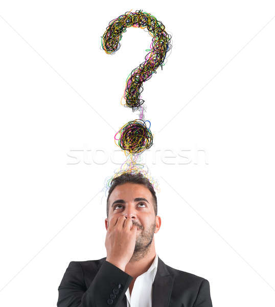 Businessman with big question Stock photo © alphaspirit