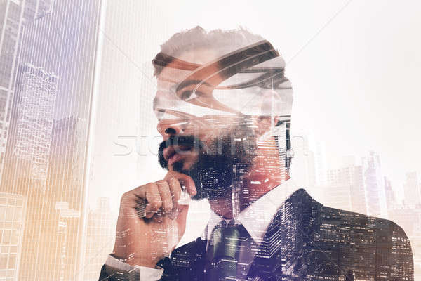 Businessman thinks new strategies Stock photo © alphaspirit