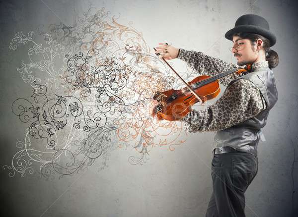 Violonist tineri epocă floare efect muzică Imagine de stoc © alphaspirit
