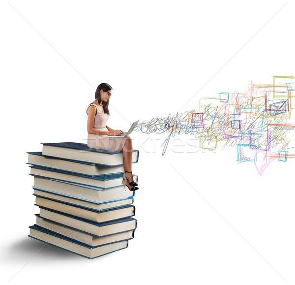 Stock photo: Laptop and books