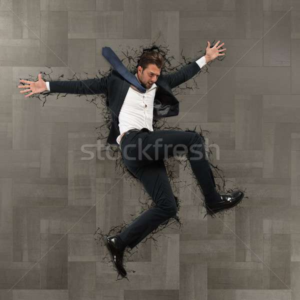 Crack businessman Stock photo © alphaspirit