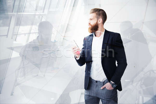 Businessman looks far for the future. Concept of innovation and startup Stock photo © alphaspirit