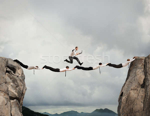 Business men support bridge Stock photo © alphaspirit