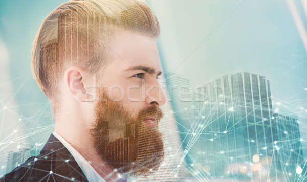 Businessman looks far for the future. Concept of innovation and startup. double exposure Stock photo © alphaspirit