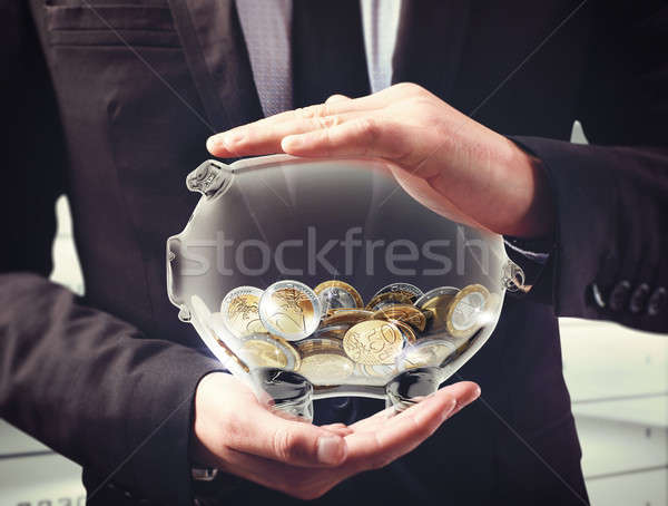 Sicherung Ertrag Mann transparent Sparschwein Münzen Stock foto © alphaspirit