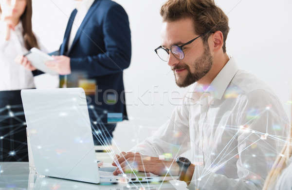 Businessman in office connected on internet network. concept of startup company Stock photo © alphaspirit