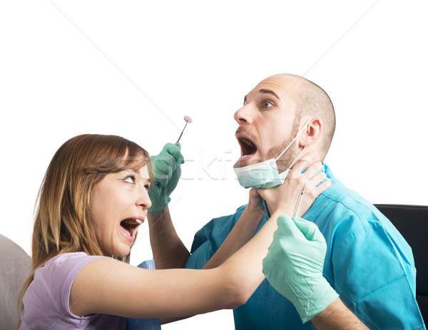 Stock photo: Angry patient by dentist
