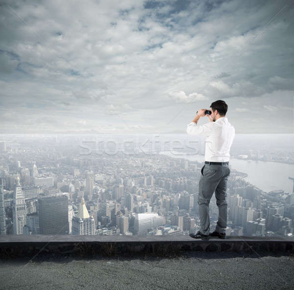 Businessman looking to the future Stock photo © alphaspirit