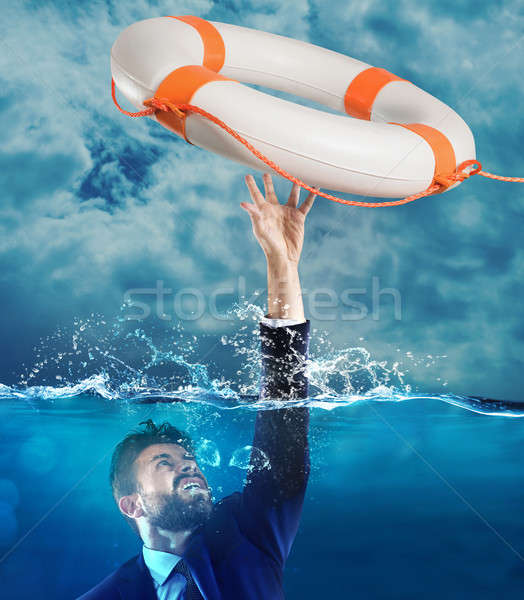 Segítség üzletember vizbefulladás férfi tenger üzlet Stock fotó © alphaspirit