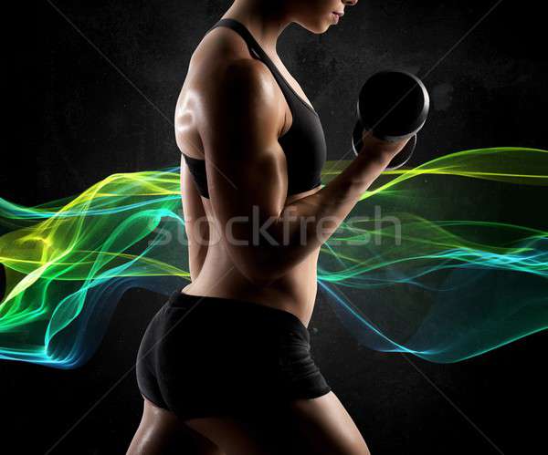 Energy muscular woman Stock photo © alphaspirit