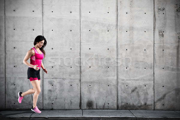 Athletic woman runner Stock photo © alphaspirit