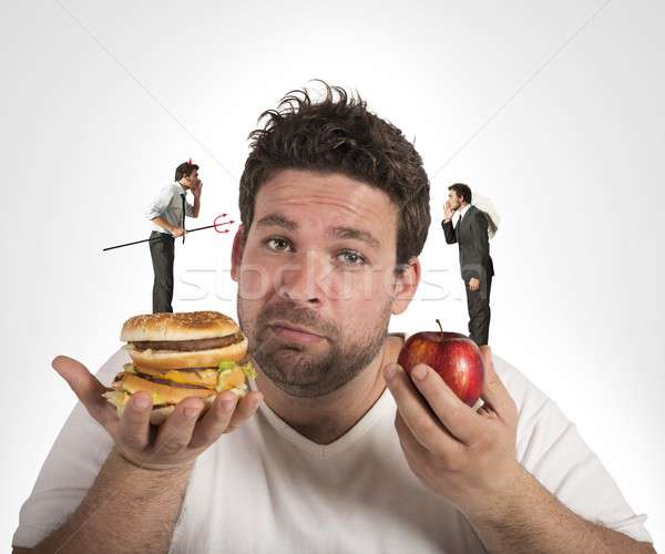 Dieta culpado consciência homem comida saúde Foto stock © alphaspirit