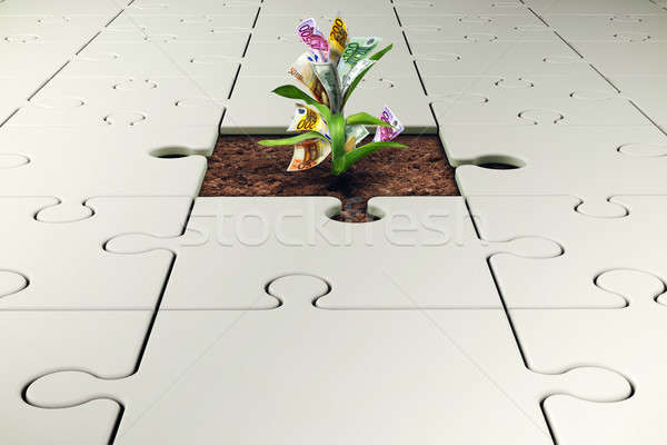 Plant with money grows from a missing piece of puzzle Stock photo © alphaspirit