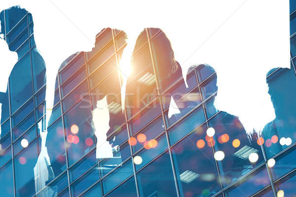 Businessmen that work together in office. Concept of teamwork and partnership Stock photo © alphaspirit