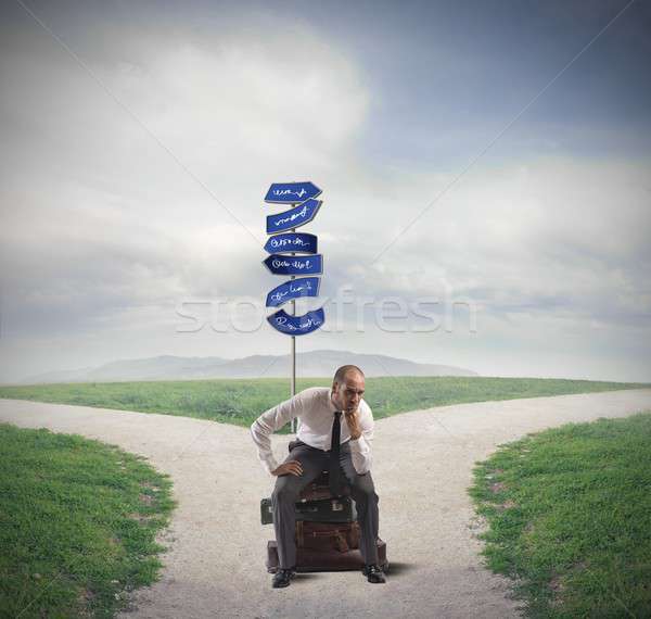 Perdido empresario confundirse sesión maletas negocios Foto stock © alphaspirit