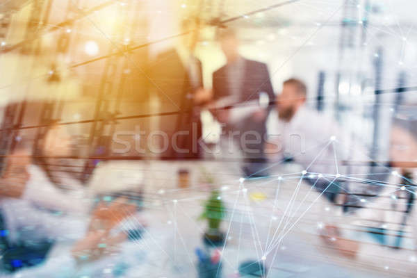 Businessperson in office connected on internet network. concept of partnership and teamwork Stock photo © alphaspirit