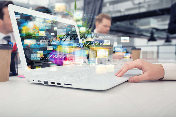 Businesswoman shares online document with a fast internet connection Stock photo © alphaspirit