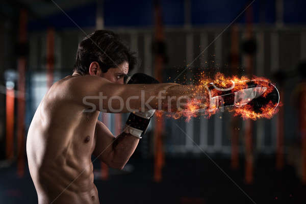 Boxoló tüzes boxkesztyűk határozott férfi sport Stock fotó © alphaspirit