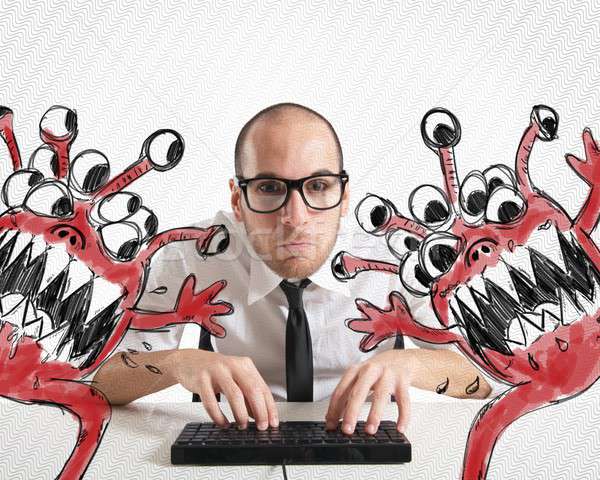 Businessman attempts to eradicate computer from viruses Stock photo © alphaspirit