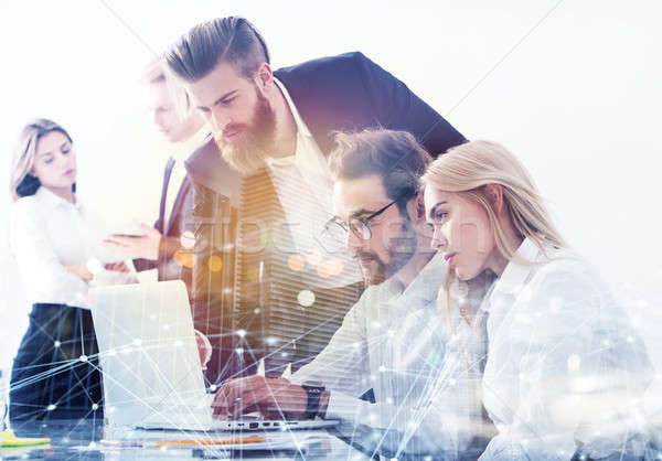 Businessman in office connected on internet network with network effects. concept of startup company Stock photo © alphaspirit