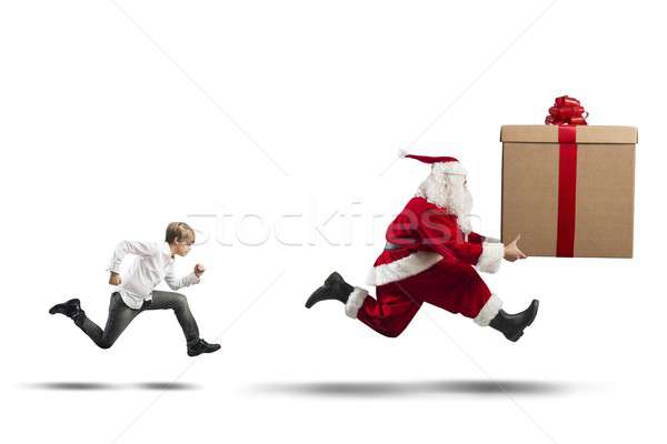 Child wants a present from Santa Claus Stock photo © alphaspirit