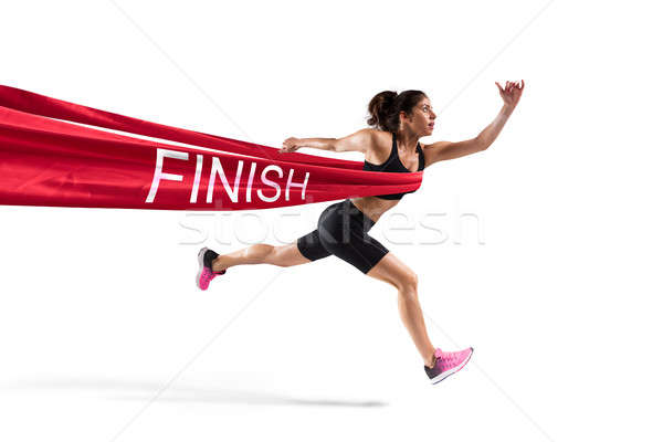 Winner woman runner on the finish line Stock photo © alphaspirit