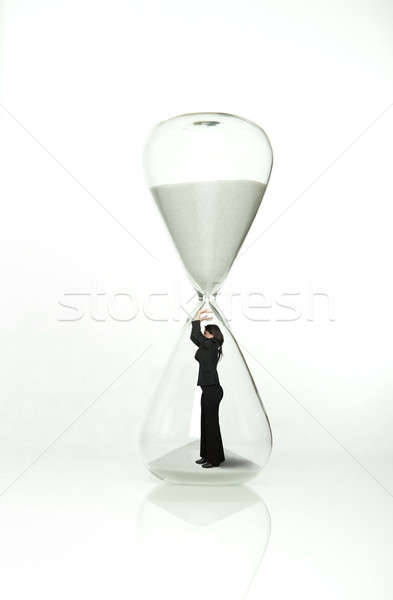 Businesswoman stops time Stock photo © alphaspirit