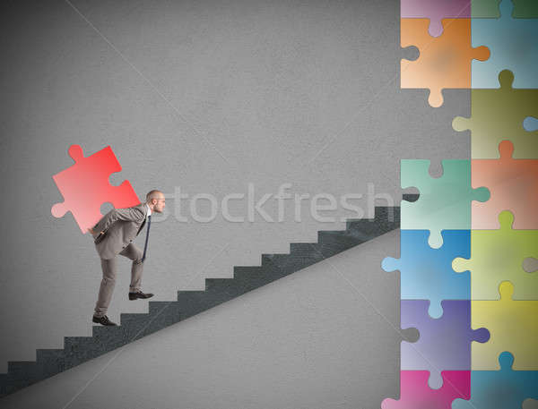 Missing piece of puzzle of a businessman build a new company Stock photo © alphaspirit