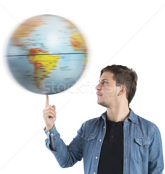 Boy turns the globe Stock photo © alphaspirit