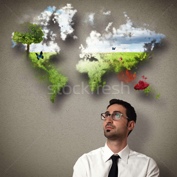 Businessman imagines a clean world Stock photo © alphaspirit